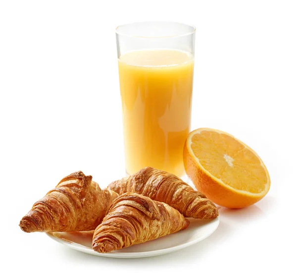 Croissants and orange juice — Stok fotoğraf