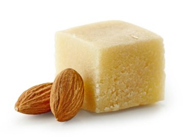 piece of marzipan and almonds isolated on white background, selective focus clipart
