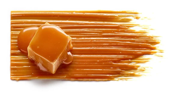 Beyaz Arkaplanda Izole Edilmiş Karamel Şekerlerin Bileşimi Üst Görünüm — Stok fotoğraf