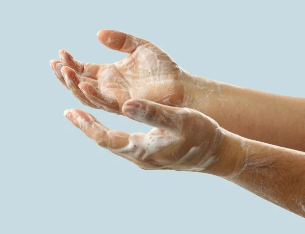 Hands Soap Foam Blue Background Sharpness Further Arm — Stock Photo, Image