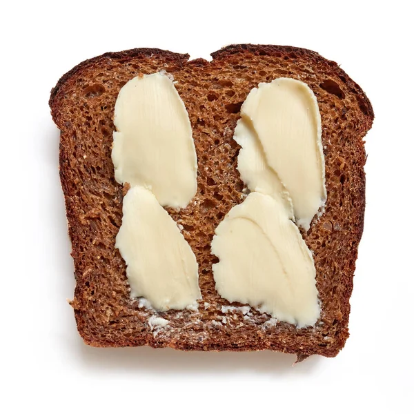 Plasterek Chleba Żytniego Masłem Izolowanym Białym Tle Widok Góry — Zdjęcie stockowe