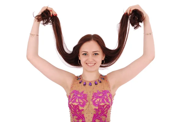 Girl playing hair in evening dress — Stock Photo, Image