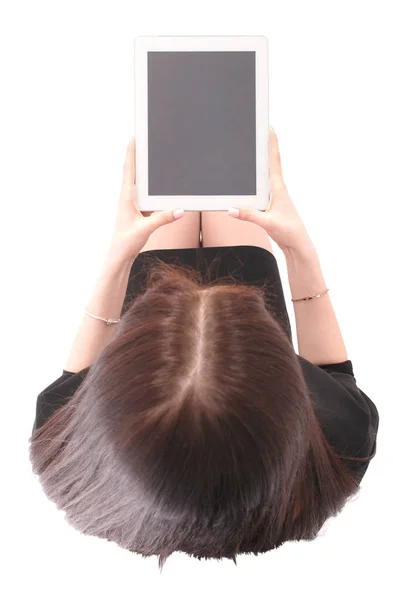 Adolescente détient la vue tablette ordinateur d'en haut — Photo