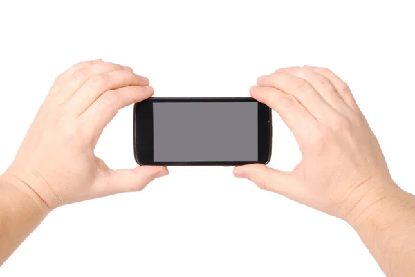 Mann hält das Smartphone in der Hand — Stockfoto