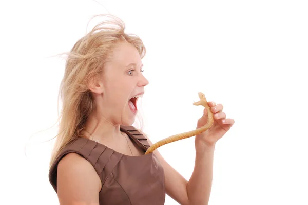 Teenage girl fights with toy snake, simulating  the fear of a snake — Stock Photo, Image