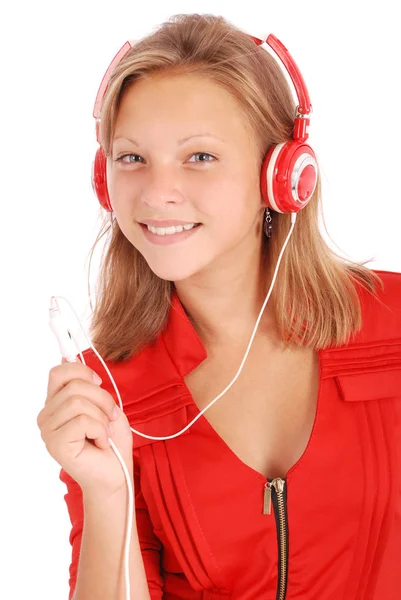 Jolie adolescente écoutant de la musique sur son casque — Photo