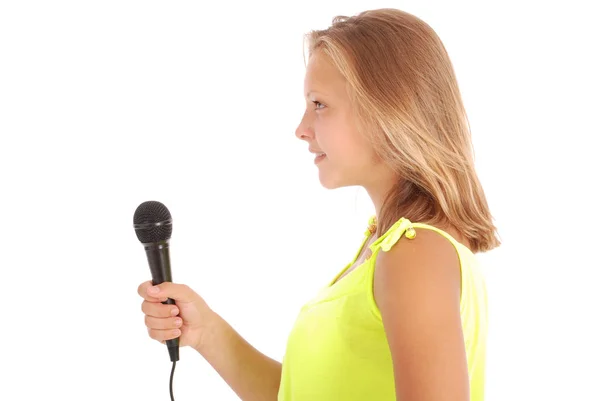 Beautiful teenage girl with microphone Stock Picture