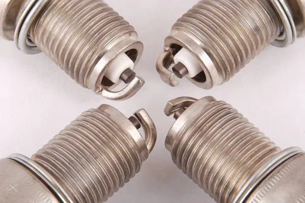 Four new spark plugs — Stock Photo, Image