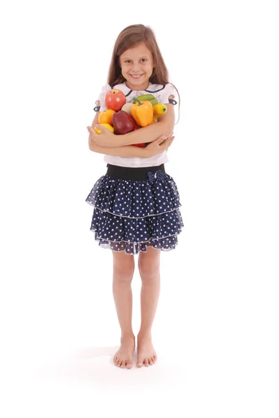 Ragazza che tiene frutta fresca — Foto Stock