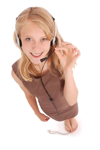 Hermosa chica estudiante operador de servicio al cliente con auriculares —  Fotos de Stock