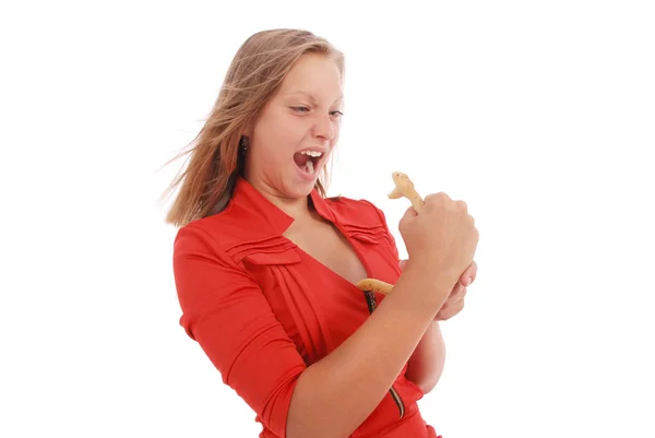 Teenage girl fights with toy snake, simulating  the fear of a snake — Stock Photo, Image