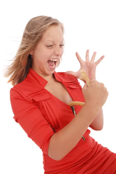 Teenage girl fights with toy snake, simulating  the fear of a snake — Stock Photo, Image