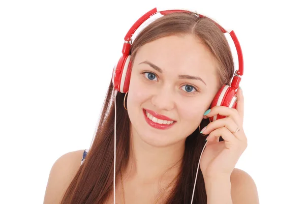 Jolie adolescente écoutant de la musique sur son casque — Photo