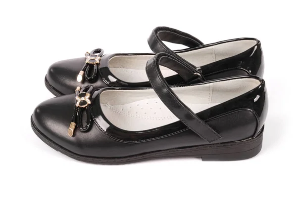 Een paar zwart lederen schoenen voor kinderen — Stockfoto