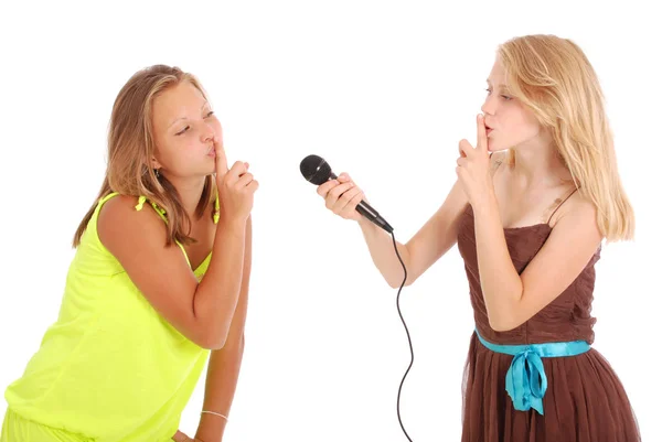 Young beautiful teenage girl conducts interviews with the singer Royalty Free Stock Images