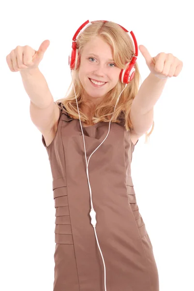 Jolie adolescente écoutant de la musique sur son casque — Photo