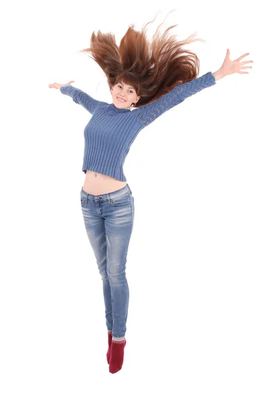 Full längd porträtt av en glad flicka som hoppar — Stockfoto
