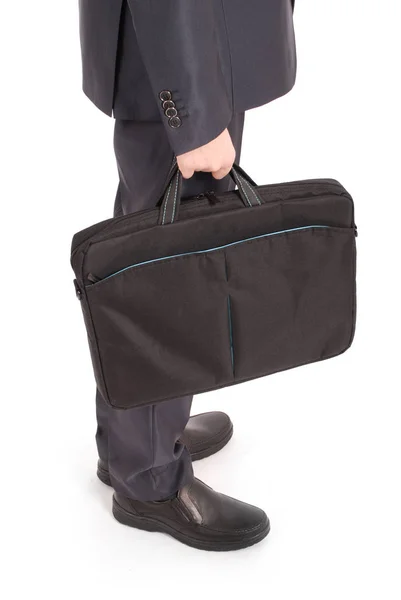 Man in a black suit with a portfolio — Stock Photo, Image