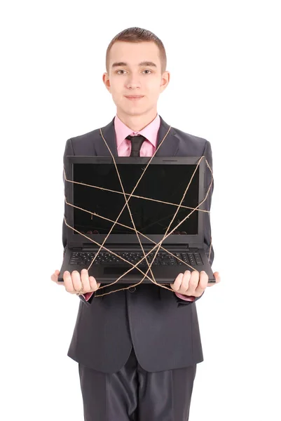 Hombre de traje negro con portátil —  Fotos de Stock