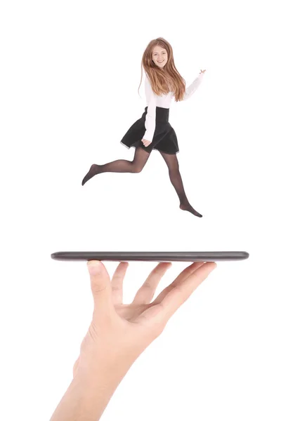 Chica joven saltar usando tableta pc en la mano de la gente —  Fotos de Stock