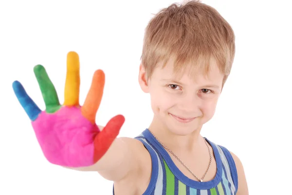 Gyönyörű kisfiú, a kezek a festék — Stock Fotó