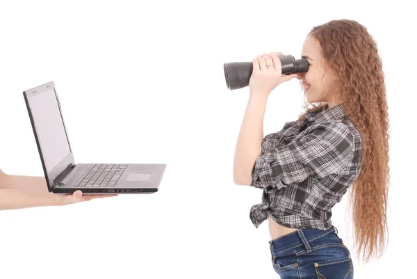 Happy teen school girl using binoculars looking at laptop screen — Stock Photo, Image