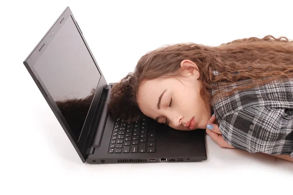 Young girl sleeps on laptop — Stock Photo, Image