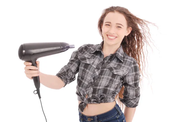 Young girl using hairdryer — Stock Photo, Image