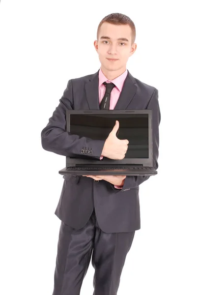 Człowiek w czarnym garniturze z laptopem — Zdjęcie stockowe