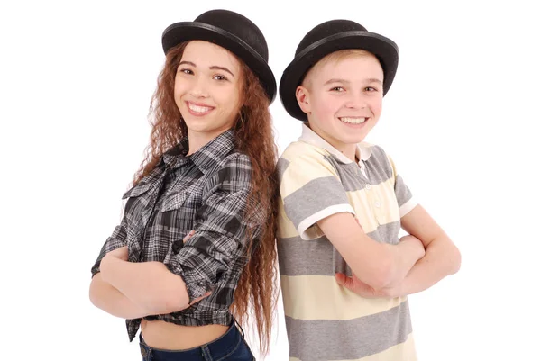 Retrato de niña y niño posando en sombrero de jugador de bolos negro —  Fotos de Stock