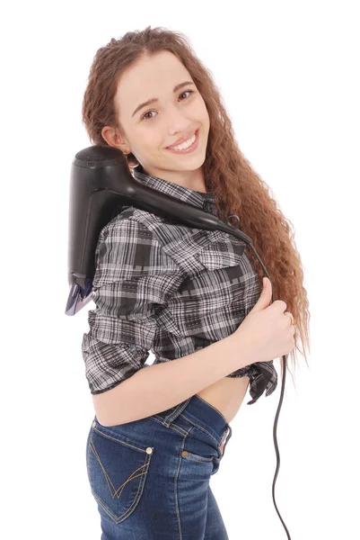 Chica joven con secador de pelo —  Fotos de Stock