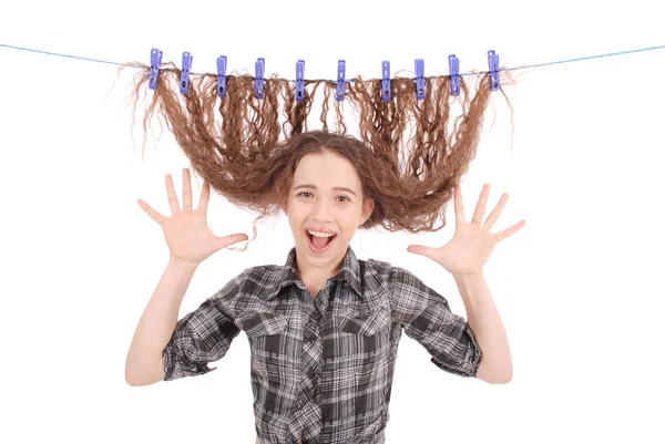 Girl drying her hair on a rope. — Stock Photo, Image