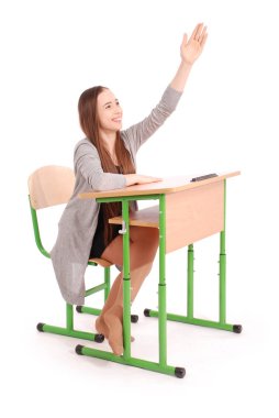 Genç liseli kız el yükselterek soru sormak