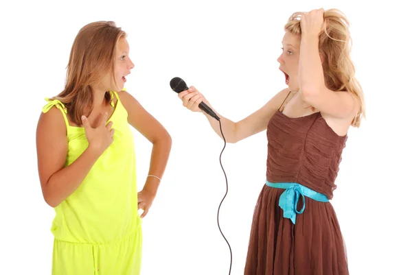 Young beautiful teenage girl conducts interviews with the singer — Stock Photo, Image