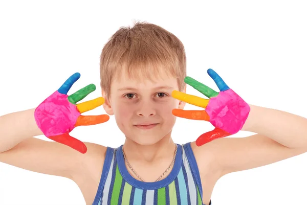 Beautiful little boy with hands in the paint — Stock Photo, Image