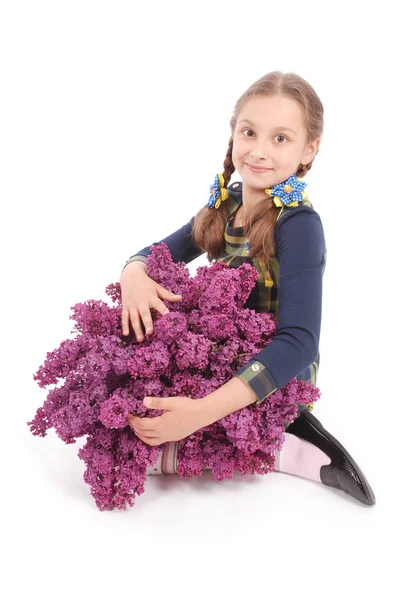 Lila ile beyaz katta oturan el çekici kız