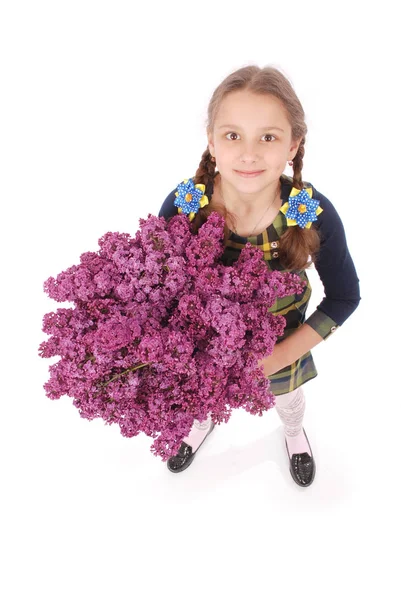 Leylak elinde ile ayakta kız genç