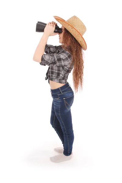 Attractive smiling young girl with binoculars — Stock Photo, Image