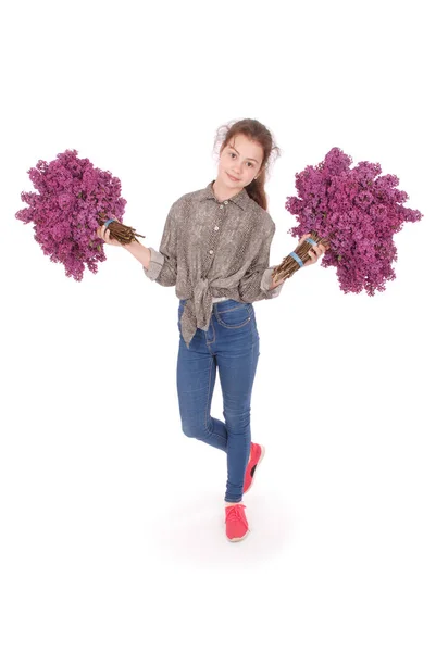 十几岁的女孩站着淡紫色的双手. — 图库照片