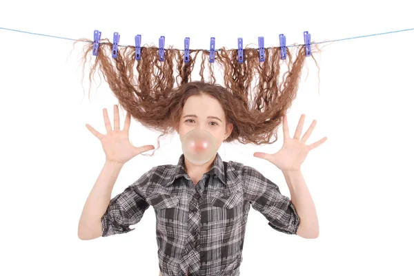 Girl drying her hair on a rope. — Stock Photo, Image