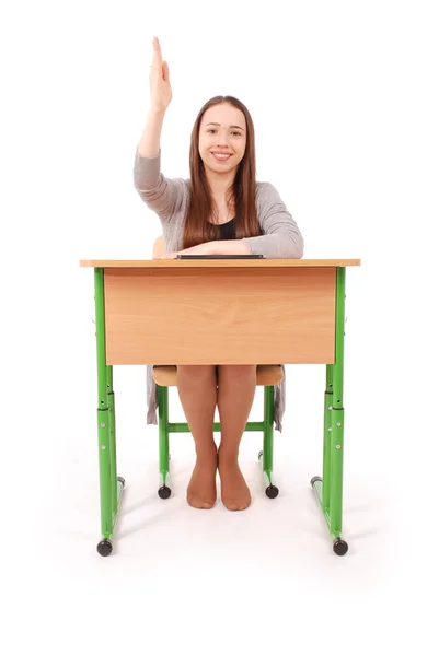 Teenager school girl raising hand to ask question — Stock Photo, Image