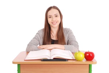 Bir masada oturan okul kız 