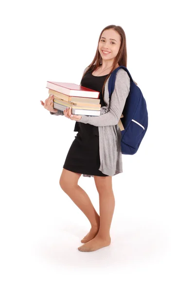 La educación, las personas, el adolescente y el concepto de la escuela adolescente chica de la escuela de pie con un libro de pila . —  Fotos de Stock