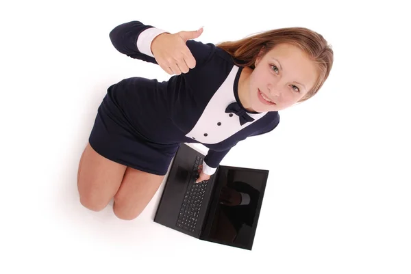 Happy student teenage girl with laptop. Sitting sideways and holding thumb up — Stock Photo, Image