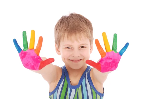 Gyönyörű kisfiú, a kezek a festék — Stock Fotó