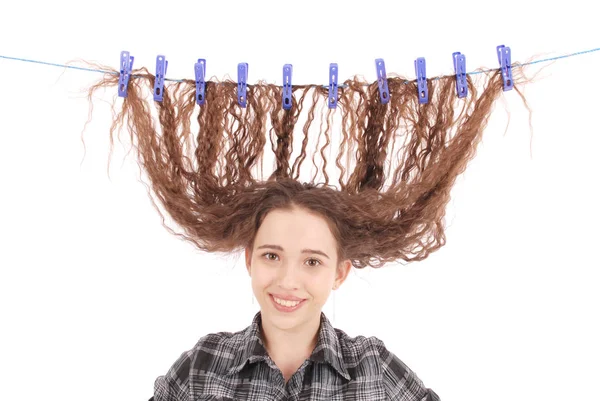 Girl drying her hair on a rope. — Stock Photo, Image