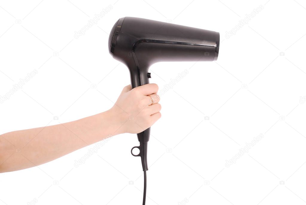 Hair dryer in woman's hand.