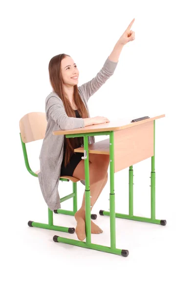 Teenager school girl raising hand to ask question — Stock Photo, Image