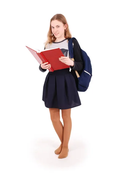 教育、 人、 青少年和学校的概念 — — 少年学校女孩站着一本红色的书 — 图库照片