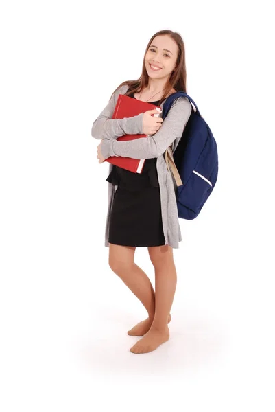 Istruzione, persone, adolescente e il concetto di scuola - adolescente ragazza della scuola in piedi con un libro rosso — Foto Stock